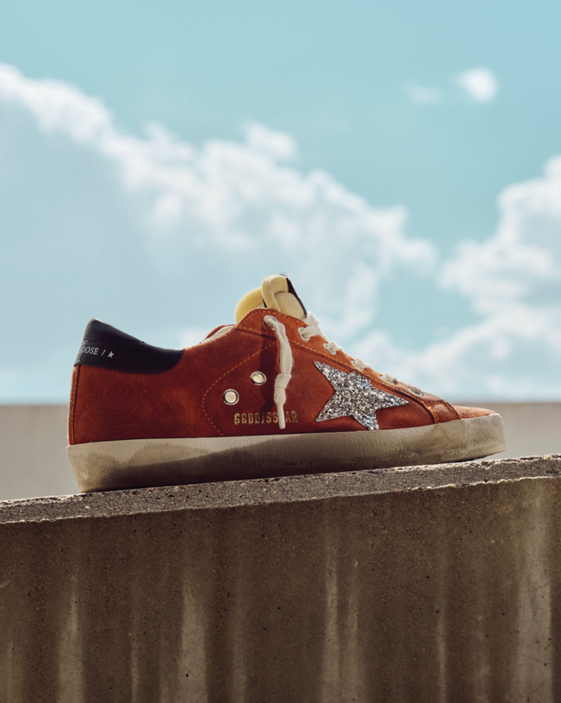 Golden Goose Sneaker with Sky in Background