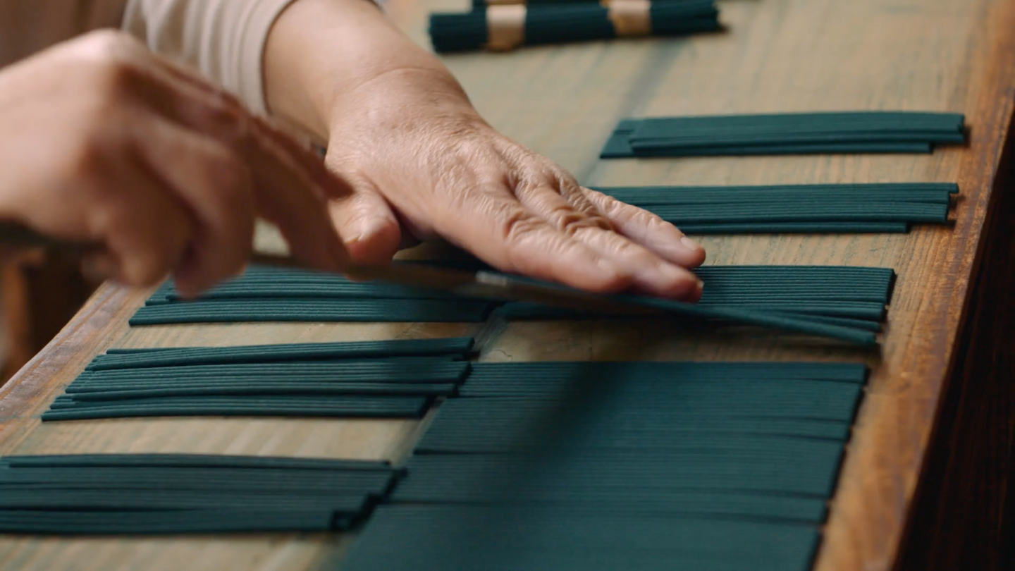 Close Up Detail of Awaji Incense being Cut in Workshop