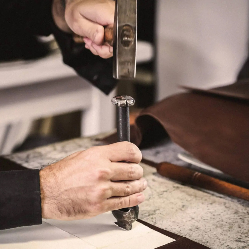 Artisan Crafting Handbag with Hammer