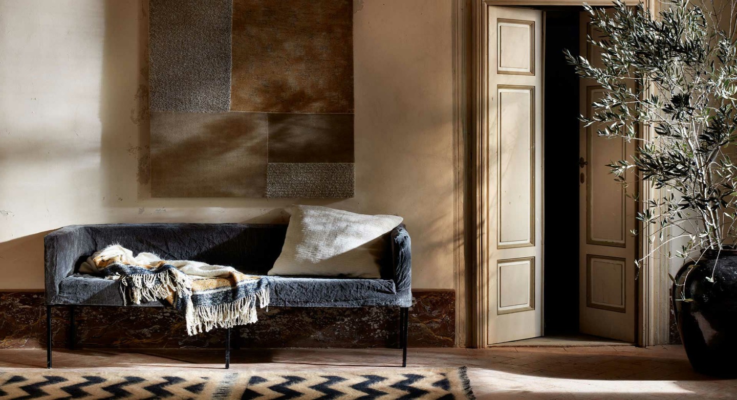 The House of Lyria Pillow and Throw on Sofa