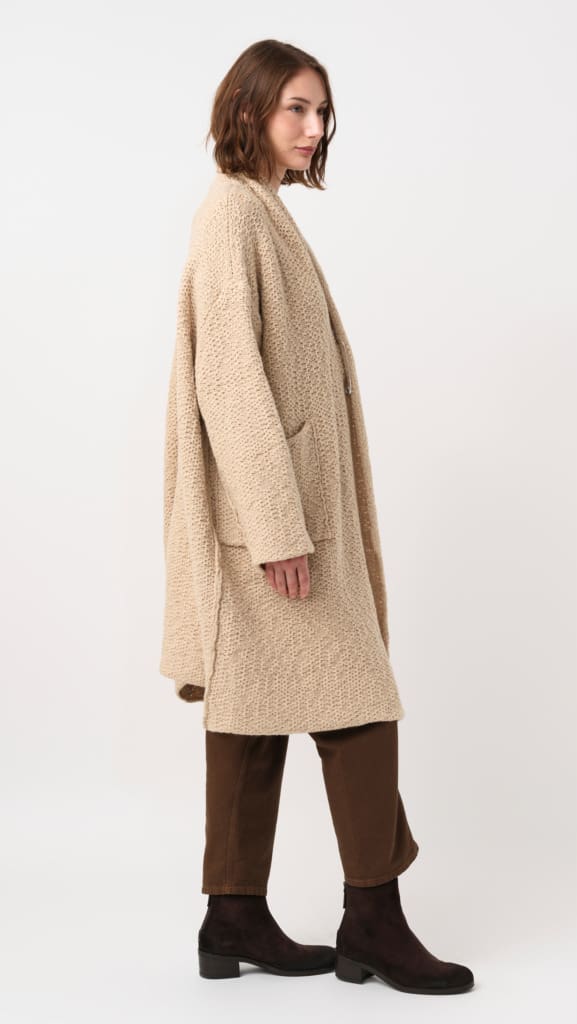 Model wearing Daniel Andresen Hand-Knit Camel Duranta Cardigan in Natural Whipped Honey