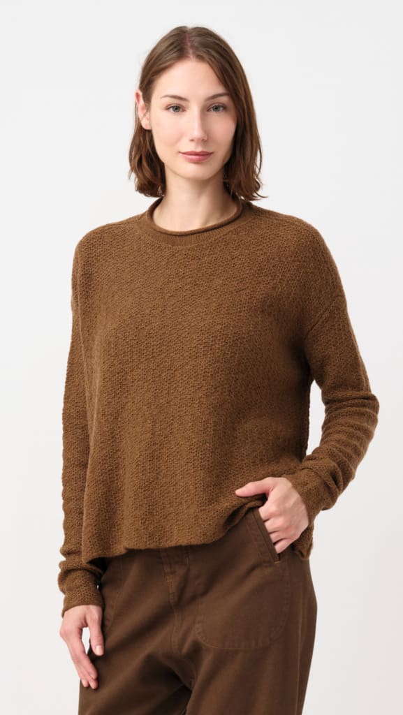 Model wearing Daniel Andresen Fine-Knit Cashmere Veronica Pullover in Vivid Vicuna Brown with Honeycomb Pattern